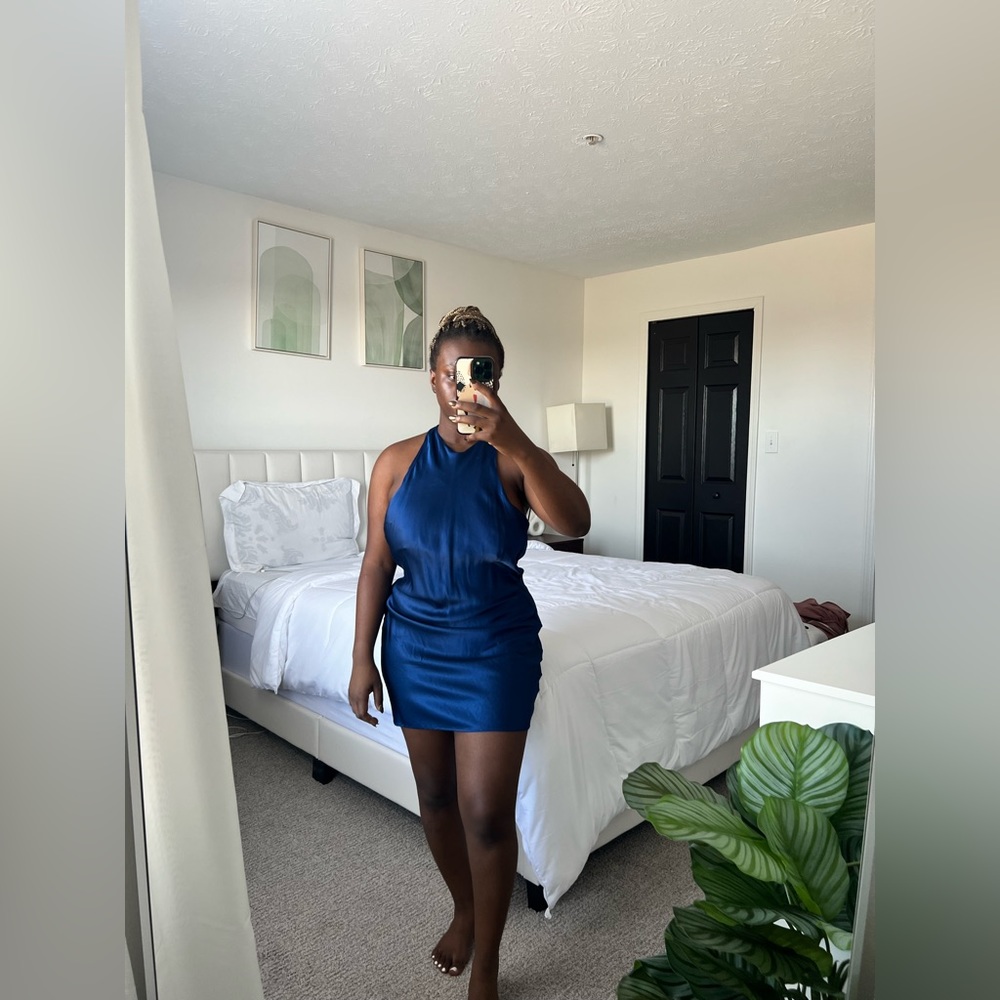 Blue mini backless dress from Zara.